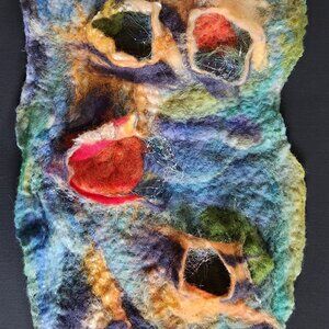 Fiber art hand felted, on black canvas.